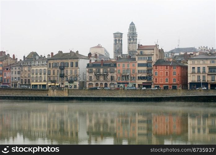 City buildings adjacent to the Saone River, Macon, France, on a cold winter&rsquo;s day