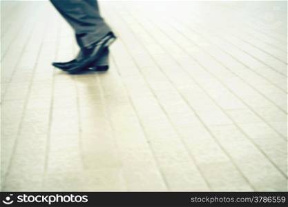 city business man walking in the street blur motion