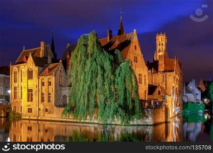 City Canal in medieval Bruges at night. Belgium. Flanders.. Bruges. City canal in night lighting.
