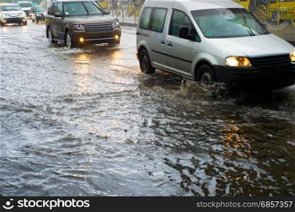 City car traffic problem in a heavy rain