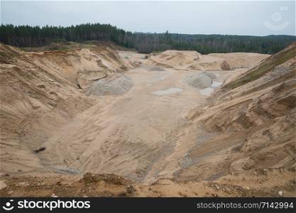 City Cesis, Latvia. A working sand quarry with a ditch excavated. Travel photo 2. november.