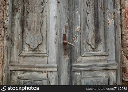 City Cesis, Latvia Republic. Old wooden door with handle. 2. November.
