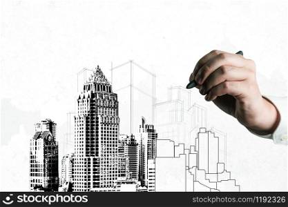 City civil planning and real estate development - Architect people looking at abstract city sketch drawing to design creative future city building. Architecture dream and ambition concept.. City civil planning and real estate development.