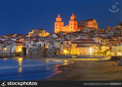 City Embankment and the Cathedral in old medieval town Cefalu at sunset. Italy. Sicily.. Cefalu. Sicily. Old city.