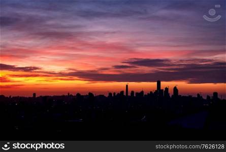 City in sunset light, silhouette of the buildings over colorful sky background, beautiful evening cityscape, Beirut, Lebanon