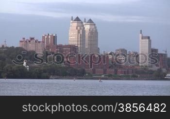 City landscape with skyscrapers on river Dnepr.