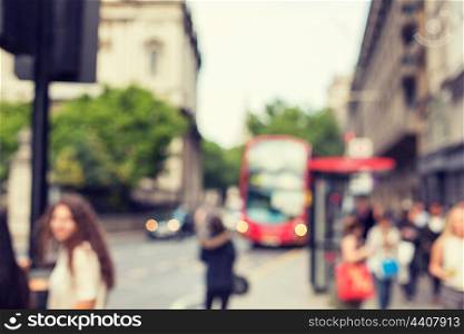 city life, public places and backgrounds concept - city street with people and transport in london