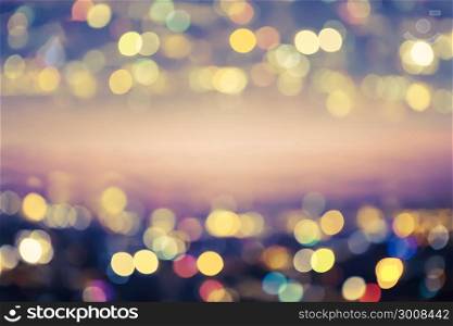 City light blurred. Green tone. Abstract bokeh background.