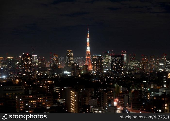 City lit up at night with Tokyo Tower in the background, Tokyo, Japan