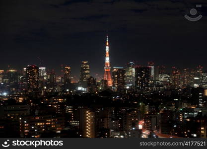 City lit up at night with Tokyo Tower in the background, Tokyo, Japan