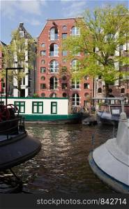 City of Amsterdam canal view in Holland, Netherlands.