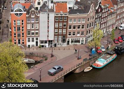 City of Amsterdam, historic row houses from above, corner of Bloemgracht and Prinsengracht streets, Holland, Netherlands.