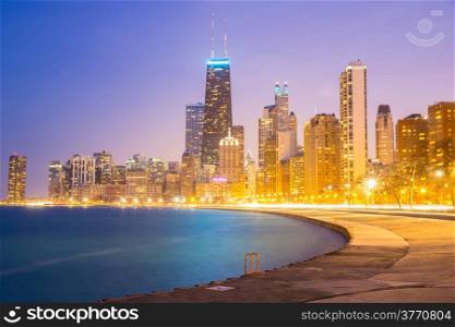 City of Chicago downtown and Lake Michigan at dusk.