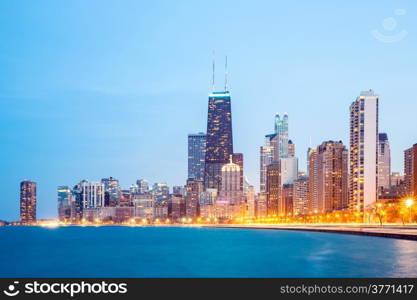 City of Chicago downtown and Lake Michigan at dusk.