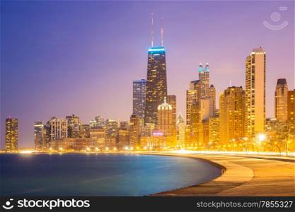 City of Chicago downtown and Lake Michigan at dusk.