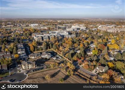 city of Fort Collins in northern Colorado, aerial view in fall scenery towards downtown and campus
