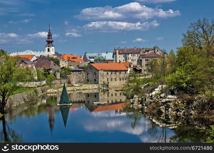 City of Gospic river reflections, Lika region, Croatia