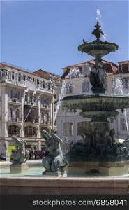 City of Lisbon - Portugal. Fountain in Rossio Square (official name - Praca de D. Pedro IV).