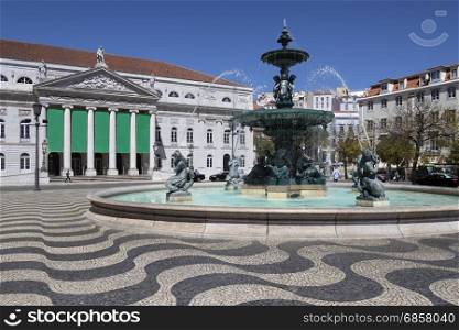 City of Lisbon - Portugal. Fountain near the Teatro National Theater in Rossio Square (official name - Praca de D. Pedro IV).