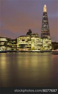 City of London on Thames. Sunset and city lights