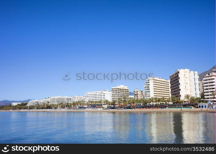 City of Marbella popular resort on Costa del Sol by the Mediterranean Sea in Southern Andalusia, Spain, composition with space for text.