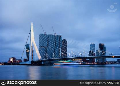 City of Rotterdam downtown skyline at dusk in South Holland, Netherlands.
