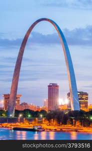 City of St. Louis skyline. St. Louis downtown with Gateway Arch at twilight.. City of St. Louis skyline. Image of St. Louis downtown with Gateway Arch at twilight.