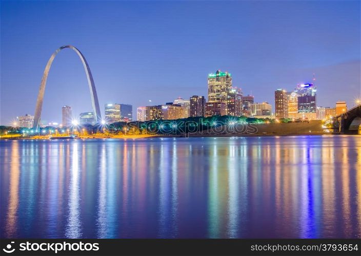 City of St. Louis skyline. St. Louis downtown with Gateway Arch at twilight.. City of St. Louis skyline. Image of St. Louis downtown with Gateway Arch at twilight.