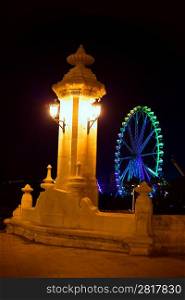 City of valencia night bridge Puente del Mar streetlights and ferry wheel