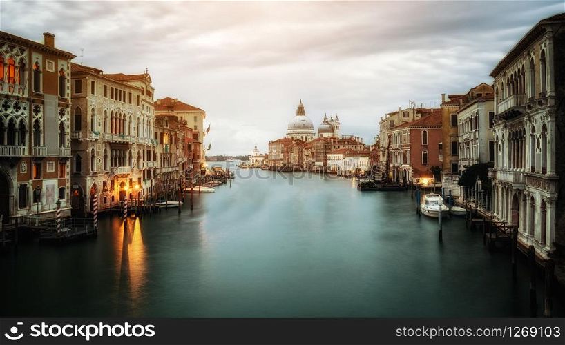 City of Venice , Italy with gorgeous view of the Venice Grand Canal and Basilica Santa Maria della Salute at sunrise. Venice is famous travel destination in Italy for its unique city and culture.