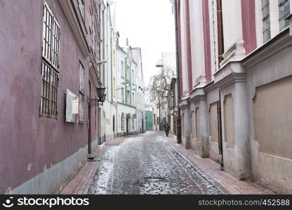 City Riga, Latvia. Old city streets, tourists and architecture. Old houses, streets and urban view. Travel photo 2019. january.Winter, snow and cold.