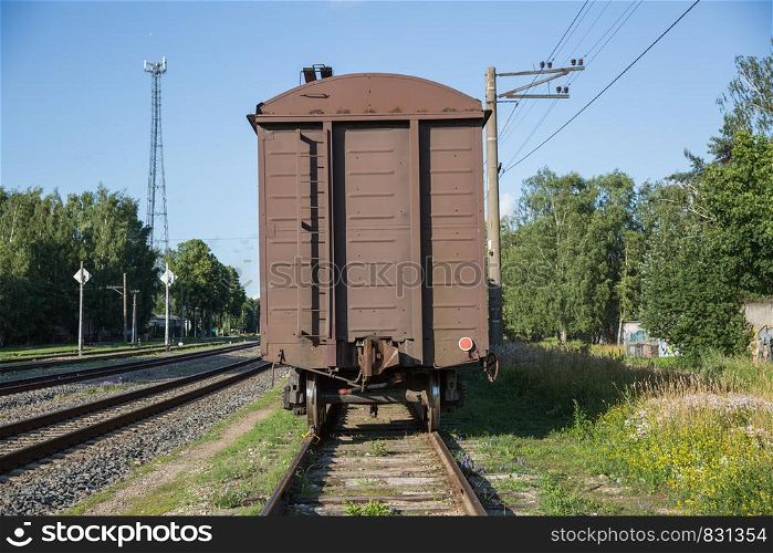 City Riga, Latvia Republic. A freight wagon is standing on a rail track. Juny 28. 2019 Travel photo.