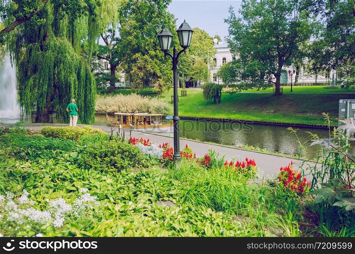 City Riga, Latvia republic. Riga Central Park with tourists and flowers, resting place.18 Aug. 2019