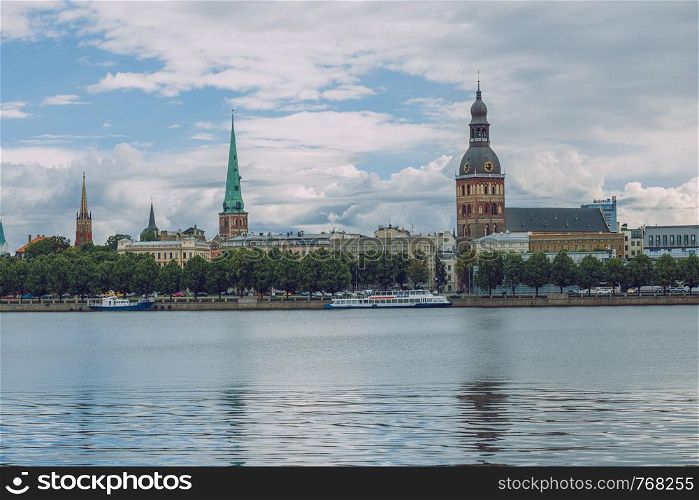 City Riga, Latvia Republic. View to old city and river Daugava. Urban city in summer. July 4. 2019 Travel photo.