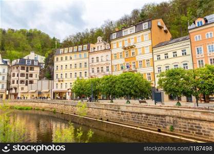 City river and old buildings, Karlovy Vary, Czech Republic, Europe. Old european town, famous place for travel and tourism. City river and old buildings, Karlovy Vary