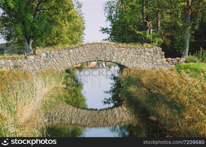 City Rundale, Latvia Republic. Park with old bridge. Sep 9. 2019 Travel photo.
