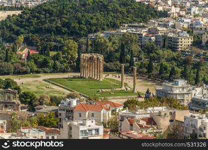 City scape of Athens in Greece, with Temple of Olympian Zeus from the Acropolis.