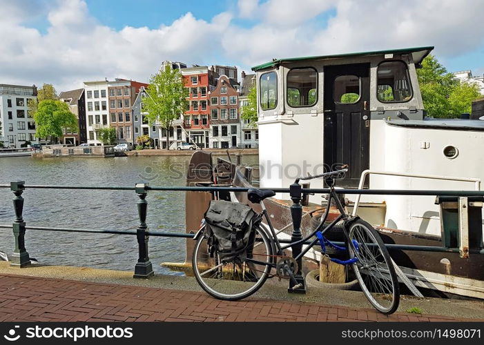 City scenic from Amsterdam at the river Amstel in the Netherlands