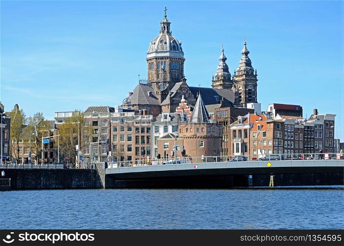 City scenic from Amsterdam in the Netherlands with the Niklaas church