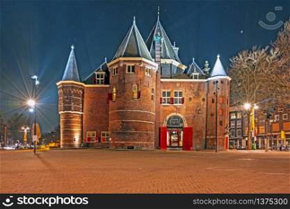 City scenic from Amsterdam in the Netherlands with the Waag building at night