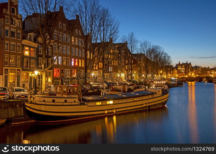 City scenic from Amsterdam with the in the Netherlands at sunset