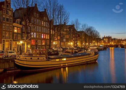 City scenic from Amsterdam with the in the Netherlands at sunset