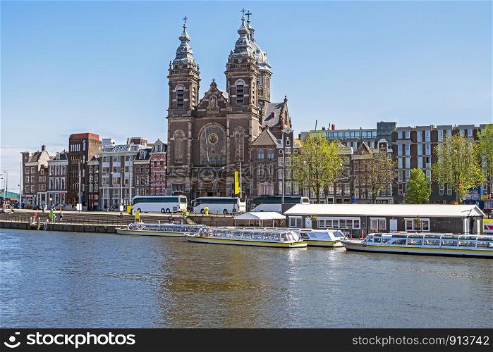City scenic from Amsterdam with the Niklaas church in the Netherlands