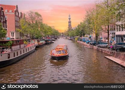 City scenic in Amsterdam the Netherlands at the Prinsengracht with the Westerkerk