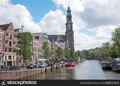 City scenic in Amsterdam the Netherlands at the Prinsengracht with the Westerkerk