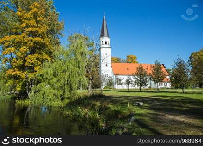 City Sigulda, Latvia Republic. Old church and green park. 27. Sep. 2019