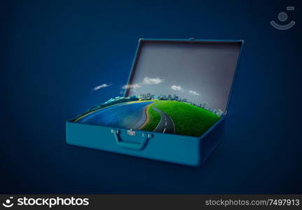 City skyline, green field, lake, mountain and curvy asphalt highway in an open retro vintage suitcase isolated on light blue background . Night scene .