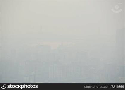 City skyline on a foggy day. Skyline of an asian city on a foggy day, smog