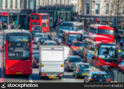 city street traffic in london blurred background.