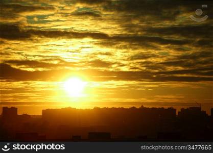 city sunrise close up yellow sky